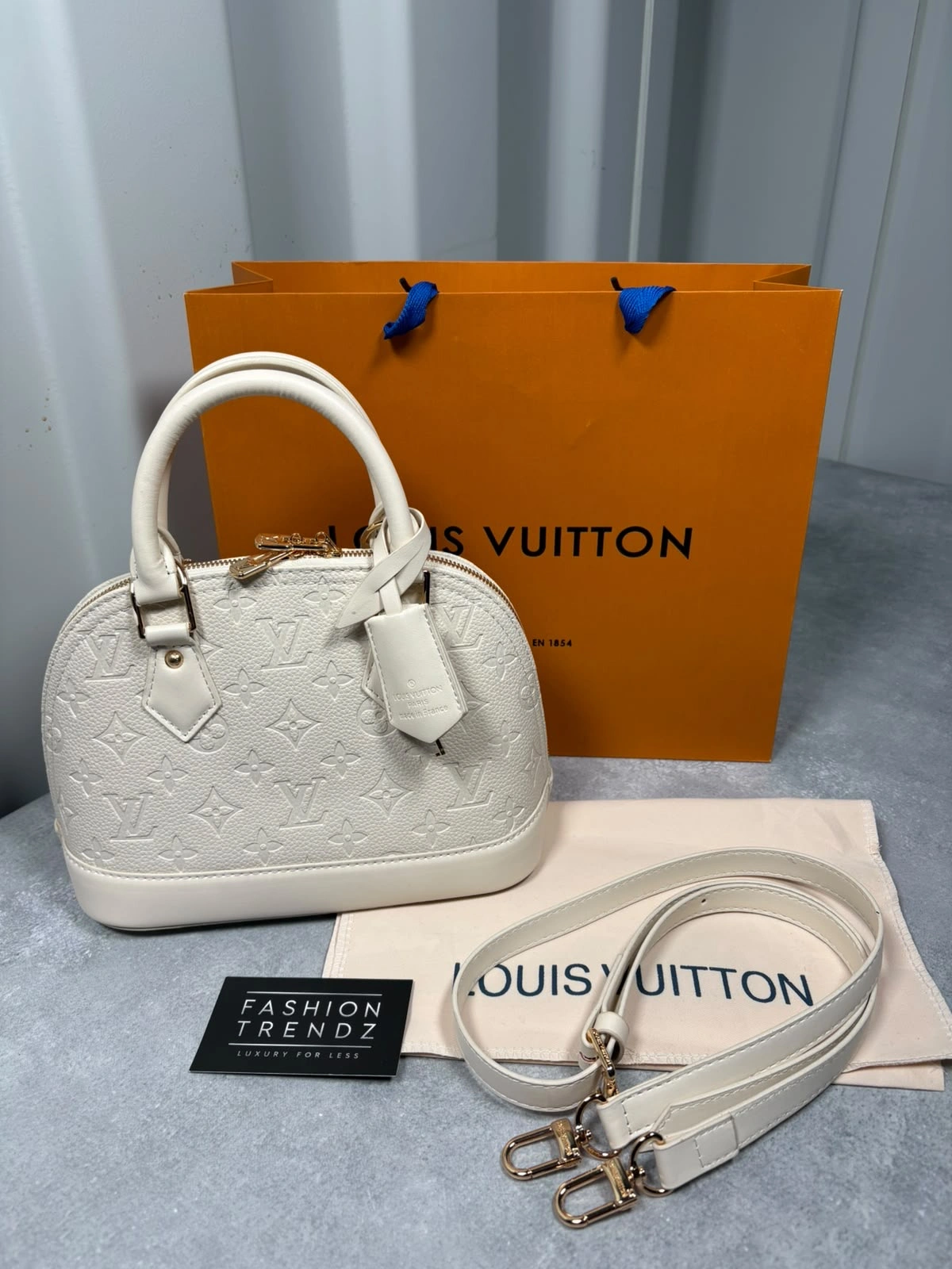 LV Cream alma bag